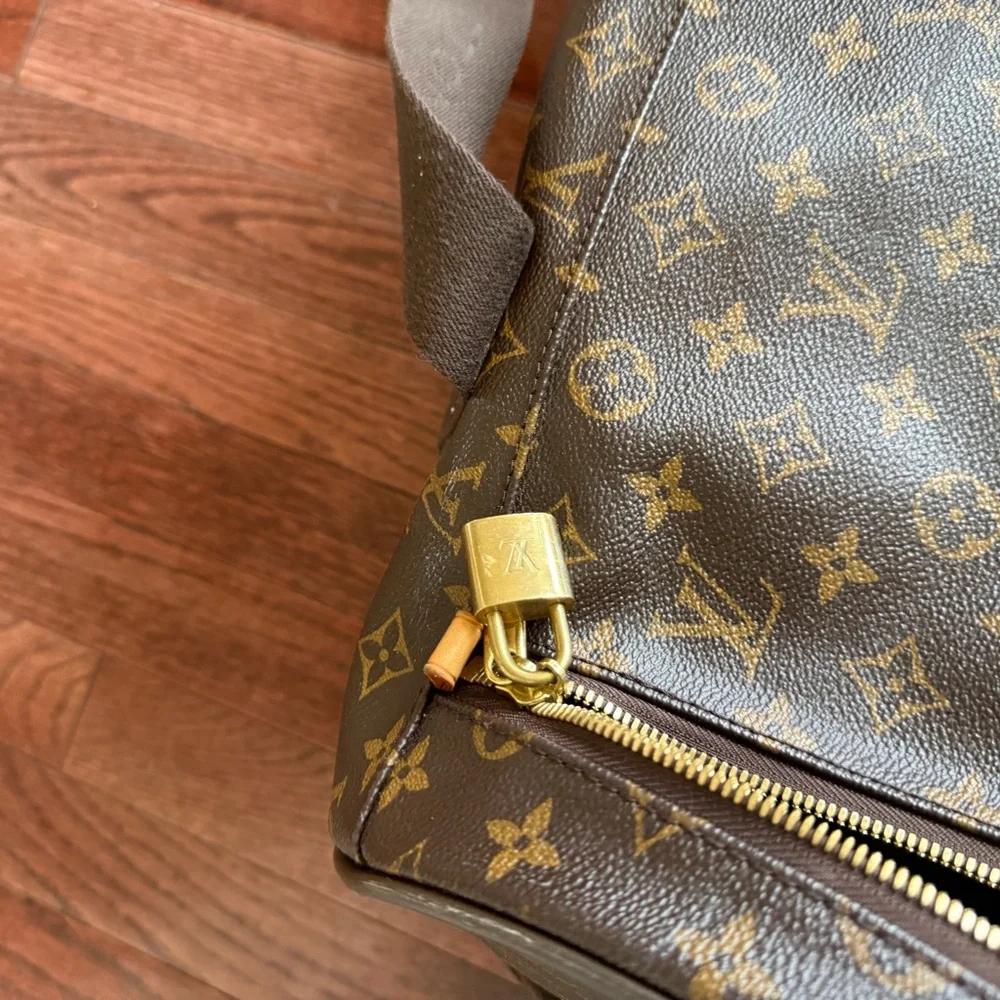Louis Vuitton Monogram Canvas Rolling Duffel in Brown and Tan